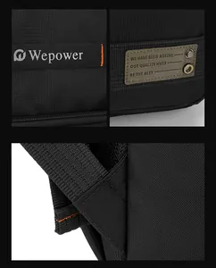 Detail of durable black canvas backpack fabric with logo strap and orange stitching