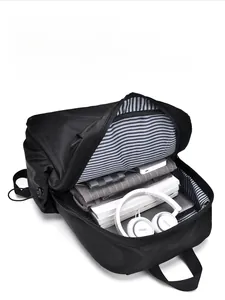 Macro view of the spacious main compartment with blue striped lining and interior storage