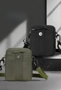 Vertical nylon crossbody bag with adjustable strap and dual multi-layer storage compartments
