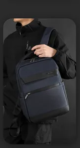 Close-up of waterproof business backpack featuring premium metal zipper and embossed logo