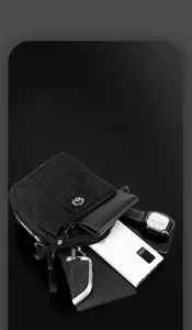 Macro view of compact nylon crossbody bag with multi-layer storage for daily essentials