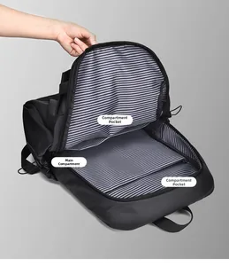Détail de l'intérieur du sac à dos avec doublure rayée et compartiments de rangement