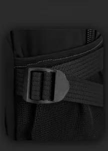 Close-up of high-density nylon fabric and breathable mesh on a black backpack
