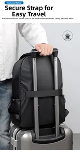 Detail of the luggage strap on the back of a black commuter business travel backpack