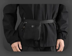 Detail of durable black nylon tactical waist bag with adjustable strap and front zipper