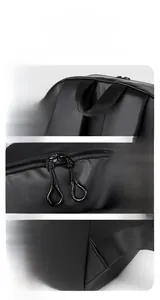 Detail of padded handle, smooth metal zippers and reinforced triangle stitching on backpack