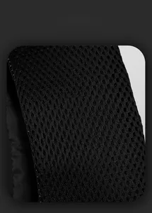 Close-up of breathable mesh padding on black backpack straps for comfort and airflow