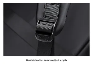 Detail of adjustable plastic buckle and durable nylon strap on black commuter backpack