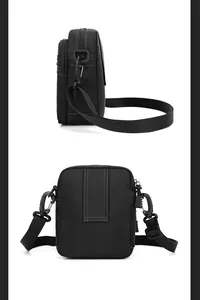 Detailansicht der schwarzen Nylontasche mit Gürtelschlaufe und seitlichen Schnallen