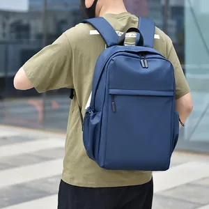 Navy blue large capacity business travel backpack with water-resistant nylon material