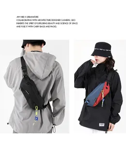 Detail of color-block cycling waist bag with adjustable strap and functional climbing rope