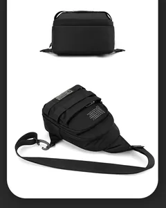 Detail view of water-resistant black tactical chest bag with adjustable strap and metal hook