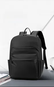 Detail of waterproof black minimalist business backpack with sleek multi-pocket design