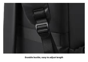 Detail of durable plastic adjustment buckle and woven strap on a black travel backpack