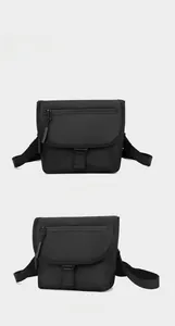 Front and side views of a black nylon crossbody bag with buckle closure and zipper pocket
