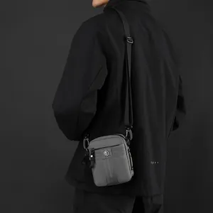 Men's gray crossbody shoulder bag made of waterproof nylon with an adjustable strap