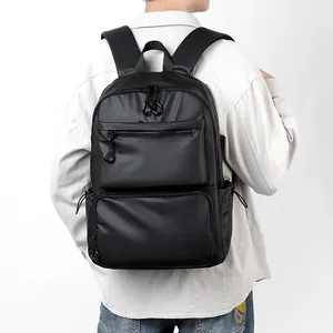 Minimalist black business commuter backpack with large capacity and waterproof fabric
