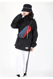 Outdoor cycling waist bag with red and blue color blocking and yellow pendant detail