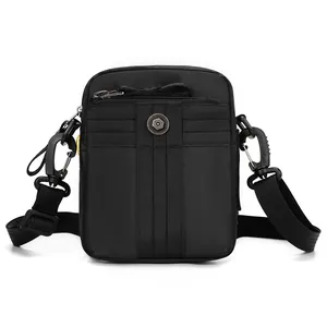 Versatile black nylon crossbody bag with dual zippers and adjustable shoulder strap