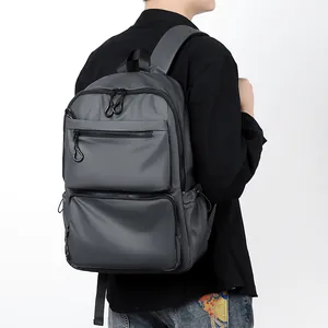 Men's large business travel backpack in dark grey water-resistant fabric for commuting