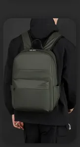 Detail view of olive green waterproof backpack with smart storage and side pocket