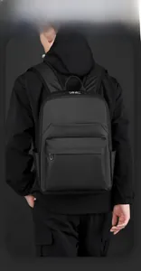 Detail view of a black waterproof business backpack with smart storage and side pocket