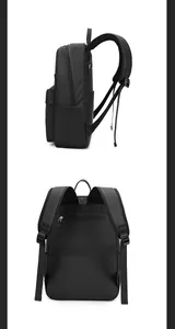 Detail view of the black business backpack showing side pocket and breathable back strap