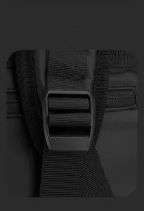Detail of smart storage space showing high-density nylon straps and matte buckle