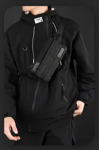 Detail of waterproof nylon tactical crossbody bag showing texture and buckle on chest
