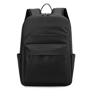 Minimalist black waterproof business backpack with hidden front pocket and padded straps