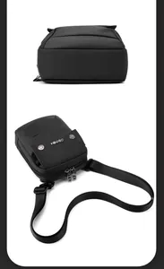 Detail view of black waterproof nylon crossbody bag showing dual zippers and logo