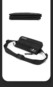 Detail of the multi-layer accordion structure and buckle on the black waterproof chest bag