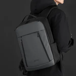 Waterproof business backpack in dark grey and black with high-capacity compartments