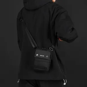 Minimalist black waterproof nylon crossbody bag with adjustable strap for men's fashion