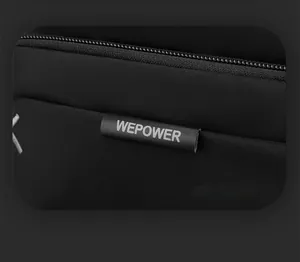 Close-up of black nylon chest bag featuring a textured finish and WEPOWER brand logo