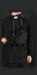 Detail of black techwear waist bag showing durable nylon fabric and WEPOWER brand logo