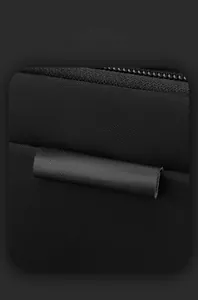 Detail showing high-density nylon texture and WEPOWER brand logo on black chest bag
