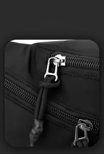 Detail of high-density waterproof nylon fabric and durable metal zipper with woven puller