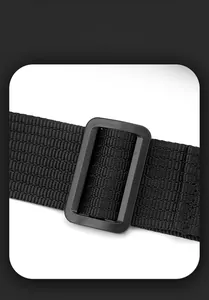 Macro view of adjustable nylon strap and plastic buckle on black men crossbody bag