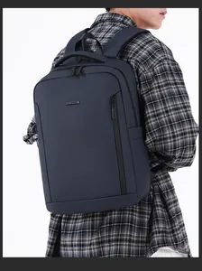 Detail of navy blue business backpack with hidden side zipper and metal logo plate