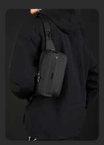Detail of waterproof nylon crossbody bag with matte finish and adjustable strap