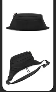 Detail of durable black nylon waist bag featuring multi-zipper pockets and quick-release buckle