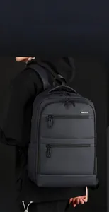 Close-up of premium waterproof nylon fabric and sleek metal zippers on the laptop backpack