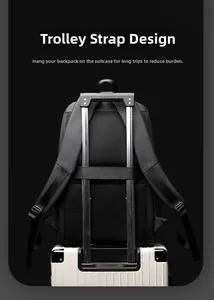 Detail of the luggage strap on a black travel backpack secured to a suitcase handle