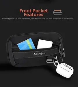 Close-up of black nylon waist bag with multiple zippers, D-ring hook, and utility pockets