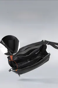 Detail view of water-resistant nylon waist bag with 60-degree quick access opening