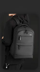 Detail showing the smart storage pockets and durable waterproof fabric of the backpack