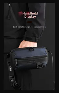Detail of blue tactical waist bag with durable hand strap and nylon texture