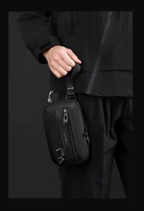 Detail of waterproof nylon waist bag showing metal zipper and K-POLLER brand logo