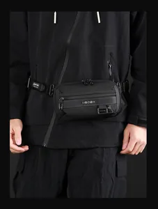 Detail of multi-pocket waterproof nylon waist bag with adjustable strap for cycling